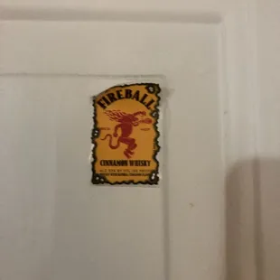 Prior guest put whisky shot stickers up.
