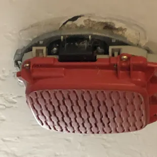 Fire alarm falling down.