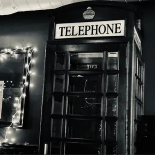 a telephone booth with lights