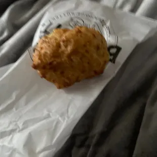 a croissant on a piece of paper