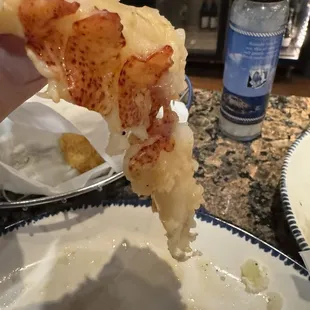 Raw lobster tail!  I mean it's part of your name get it right!