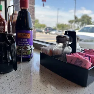a table with a variety of condiments