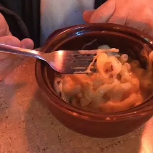 Mac &amp; Cheese - it has bacon bits which is not disclosed on the menu