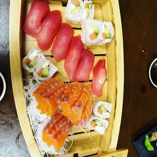 Sushi boat with Philly roll on soy paper