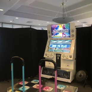 DDR machine (there are multiple dancing games and machines)