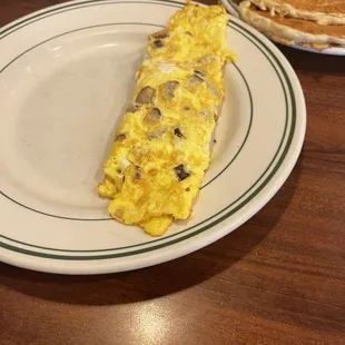 an omelet and pancakes