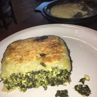 a slice of lasagna on a plate