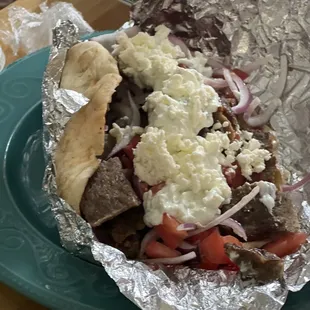 Gyro with Feta cheese on it.