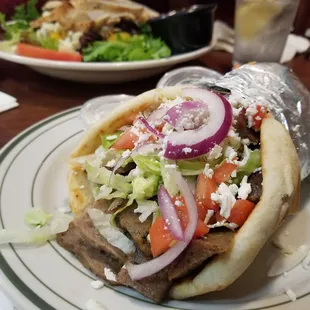 a pita sandwich on a plate