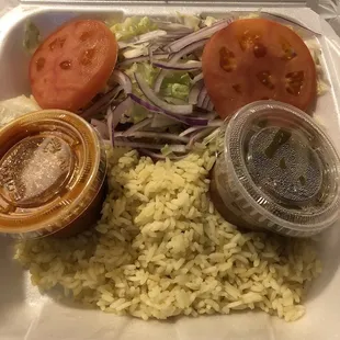 Chicken gyro plate with rice pilaf