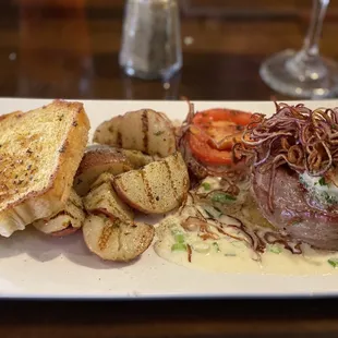 The Metro (filet mignon) with red potatoes.