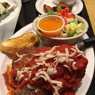Chicken Parma and salad