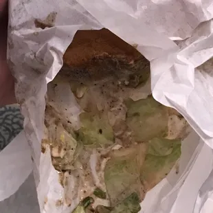Back gristle that I assume is from cooktop, gross wouldn&apos;t even wash off my fingers did not eat