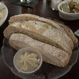 Warm bread with what might be honey butter