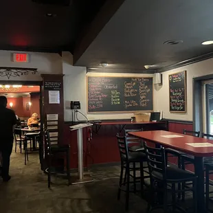 a restaurant with tables and chairs