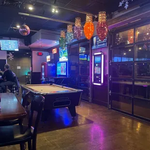 a pool table and arcade