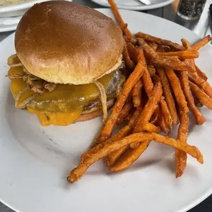 Cowboy burger with sweet potato fries.