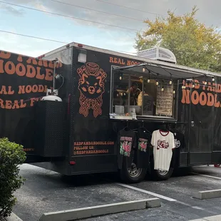 a food truck parked in a parking lot