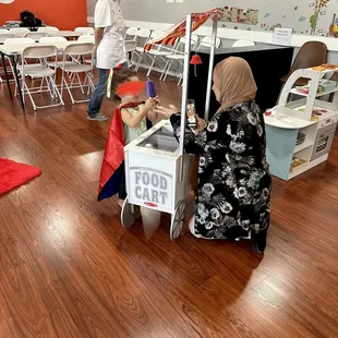 A super hero is selling ice cream!