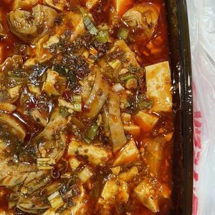 Tofu and intestines... there is black bean sauce. So good.