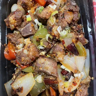 Pork Ribs spicy with onions. I wish it has more meat very tasty. Perfect spice.