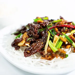 Crispy Rice Noodle with Beef on top.  Aka Mongolian Beef.  Fresh and made to order.
