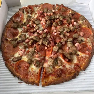 Awesome pizza.  We really enjoyed. We got it go. Fast and friendly service.