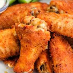a plate of chicken wings