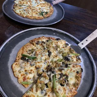 Ultimate Veggie and Roasted Artichoke-both on GF cauliflower crusts.  Yum!!!