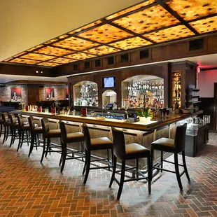 a bar with a brick floor