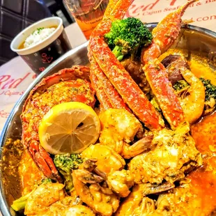 crab legs and broccoli