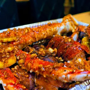 crab legs with lemon wedges