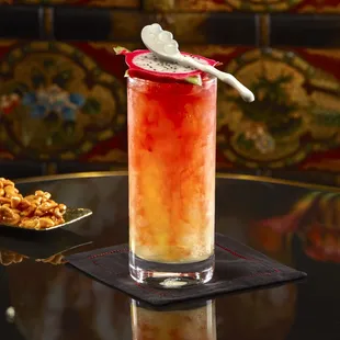Moon Festival (Dragonberry Rum, Lemongrass Ginger Shochu, Coconut Chai Tea, Lemon &amp; Moonstone Coconut Lemongrass Sake &amp; Blood Orange)