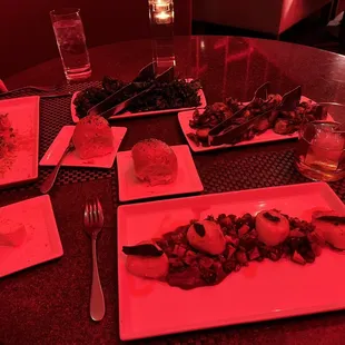 Seared scallops and lobster crusted sea bass