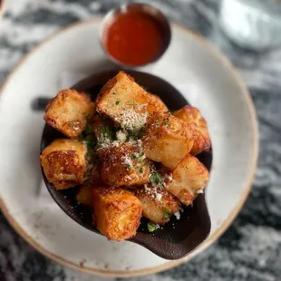 a plate of fried potatoes