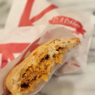 Inside the Spicy Chicken Empanada ($3.39). So good! I highly recommend it! 1/29/2023