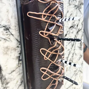 a chocolate cake with chocolate icing