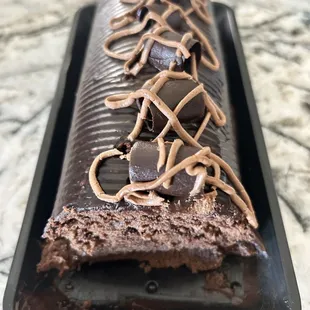a chocolate roll on a baking sheet