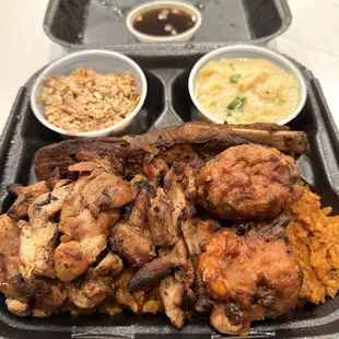 Locals Plate (BBQ chicken, BBQ pork spare rib &amp; Shrimp patties) w/ Chicken Kelaguen and Eggplant Saibok sides.