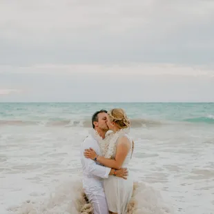 We know large weddings aren't for everyone, and if you choose to elope we'll be there for you too! This was a beach elopement at sunset.