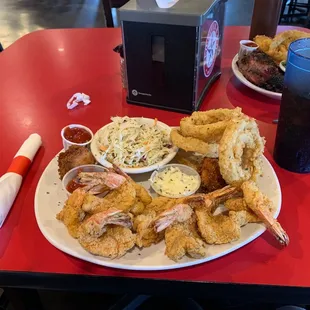 8pc shrimp with onion rings and cole slaw... yum.