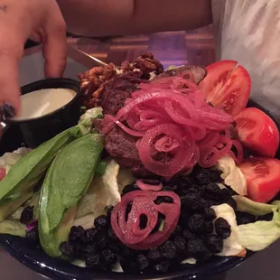 The Steak Salad is huge