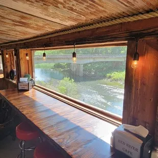 a view of a river through a window