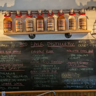 a chalkboard with a list of wines