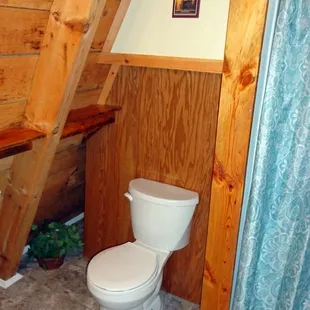 Bathroom - Wagon Wheel.  For information about this cabin, as well as RRO's other cabin's- please visit redriveroutdoors.com