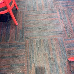 Filthy soiled floors that smell of grease &amp; have food &amp; debris all over...