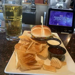 Barbecue burger with homemade chips and of course a beer.