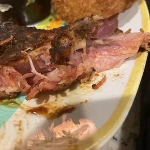 This is a plate of ribs that I ordered and I won&apos;t even give the leftovers to my dog..