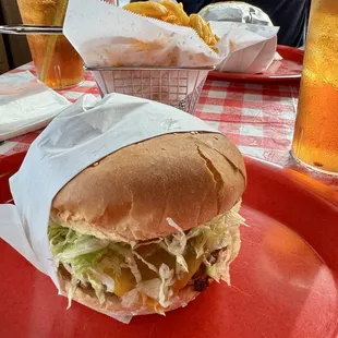 Cheddar cheese burger with guac lettuce and tomato - yummy!!