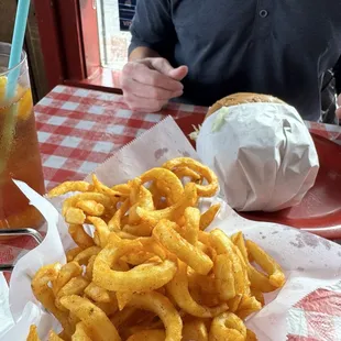 Curly fries and a burger